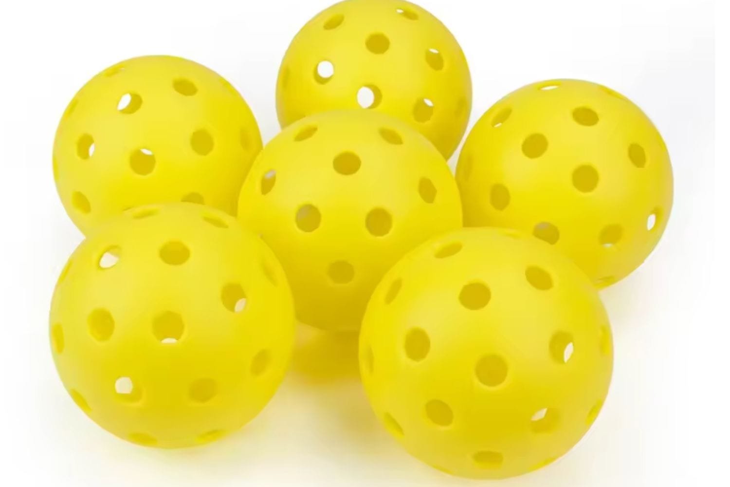Pickleball Balls to help explain common pickleball mistakes.
